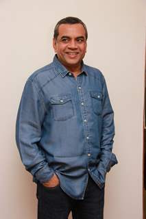 Paresh Rawal poses for the media at Narata Purohit's 4th Anniversary Bash