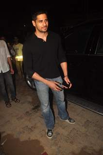 Sidharth Malhotra poses for the media at the Success Bash of Queen