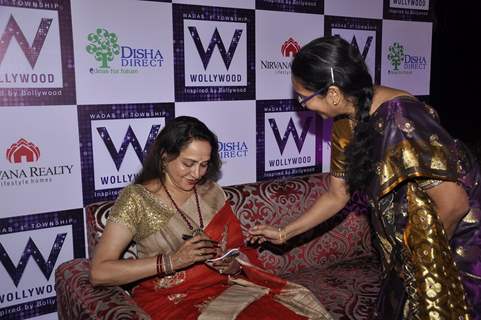 Hema Malini signs an autograph for a fan at Wollywood Project's Success Bash