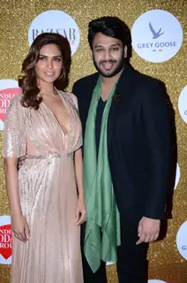 Esha Gupta poses with a guest at Harper's Bazaar Bride Anniversary Bash