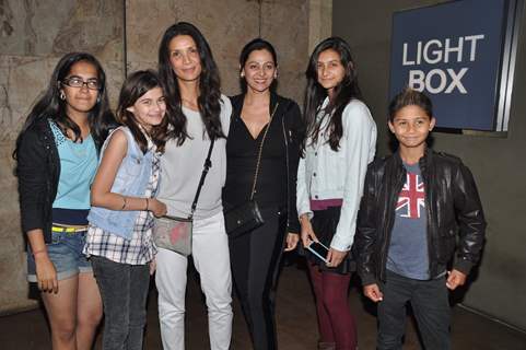 Mehr Jesia Rampal poses with children at the Special Screening of Roy