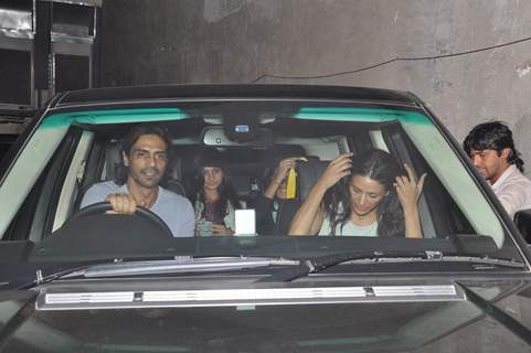 Arjun Rampal was snapped driving his car at the Special Screening of Roy