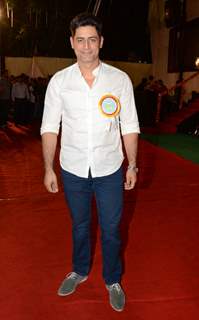 Mohit Raina poses for the media at the Annual Day of Children's Welfare Centre High School