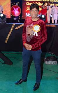 Raju Shrivastav poses for the media at the Annual Day of Children's Welfare Centre High School