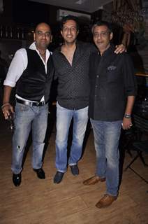 Sulaiman Merchant poses with friends at Cafe D'WINE