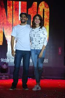Anushka Sharma and Neil Bhoopalam pose for the media at the Promotions of NH10 at NM College