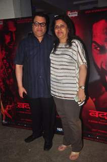 Ramesh Taurani poses with wife at the Special Screening of Badlapur