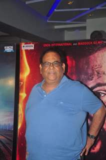 Satish Kaushik poses for the media at the Special Screening of Badlapur