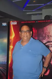 Satish Kaushik poses for the media at the Special Screening of Badlapur
