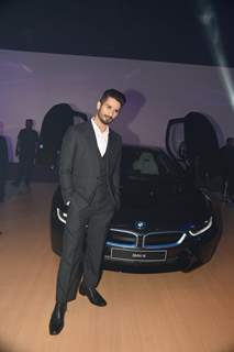 Shahid Kapoor poses alongside the new BMW i8 at the Launch