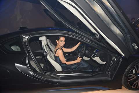 Kangana Ranaut gets behind the wheels of the new BMW i8 at the Launch