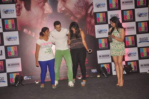 Varun Dhawan shakes a leg with fans at the Promotions of Badlapur at R City Mall