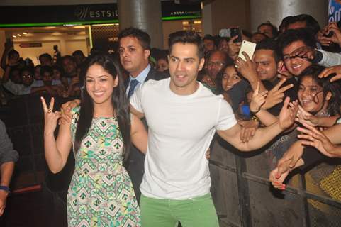 Varun Dhawan and Yami Gautam pose with fans at the Promotions of Badlapur at R City Mall