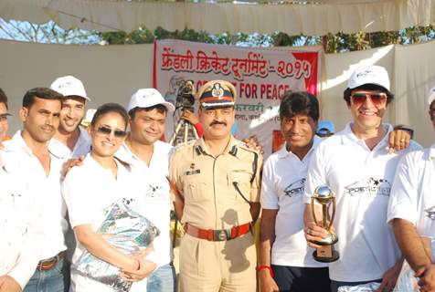 Celebs pose for the media at Cricket for Peace