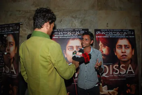 Irrfan Khan was snapped taking interview at the Special Screening of Qissa