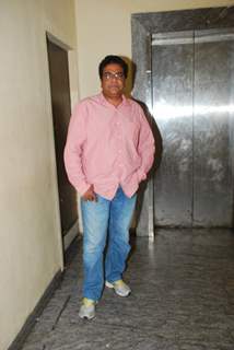 Zakir Hussain poses for the media at the Special Screening of Badlapur