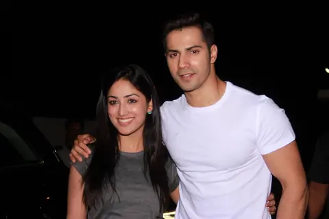 Varun Dhawan and Yami Gautam pose for the media at the Special Screening of Badlapur