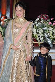 Divya Kumar poses with Son at Tulsi Kumar and Hitesh Rahlan's Sangeet Ceremony