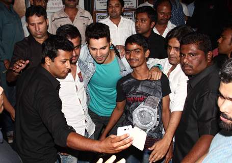 Varun Dhawan clicks a selfie with his fans at Gaiety Galaxy