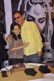 Vidhu Vinod Chopra was snapped hugging wife Anupama Chopra at the Book Launch