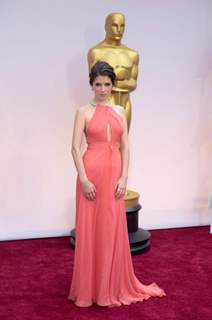 Anna Kendrick poses for the media at the Oscars Red Carpet 2015