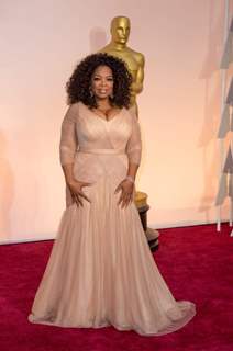 Oprah Winfrey poses for the media at the Oscars Red Carpet 2015