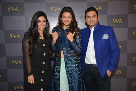 Kajal Aggarwal poses with Sonam and Paras Modi at SVA Store Launch