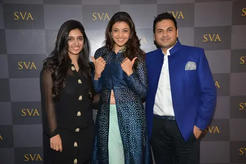 Kajal Aggarwal poses with Sonam and Paras Modi at SVA Store Launch