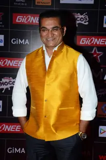 Abhijeet Bhattacharya poses for the media at GIMA Awards 2015