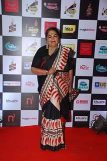 Usha Uthup  poses for the media at Radio Mirchi Awards