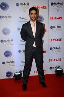 Angad Bedi poses for the media at Filmfare Glamour and Style Awards