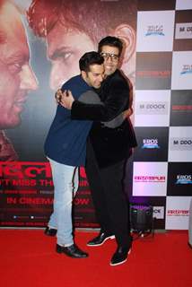 Karan Johar hugs Varun Dhawan at the Success Bash of Badlapur