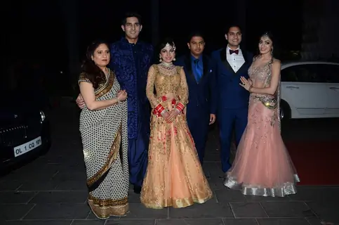 Tulsi Kumar poses with her family members at her Wedding Reception