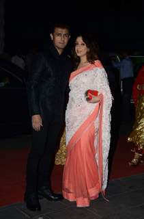 Sonu Nigam poses with his Wife at Tulsi Kumar's Wedding Reception