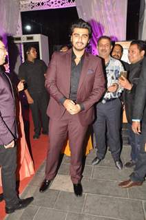 Arjun Kapoor poses for the media at Tulsi Kumar's Wedding Reception