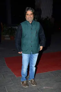 Vishal Bharadwaj poses for the media at Tulsi Kumar's Wedding Reception