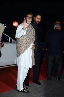 Amitabh Bachchan and Abhishek Bachchan pose for the media at Tulsi Kumar's Wedding Reception