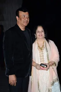 Anu Malik poses with wife at Tulsi Kumar's Wedding Reception