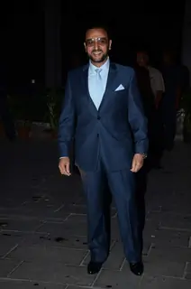 Gulshan Grover poses for the media at Tulsi Kumar's Wedding Reception