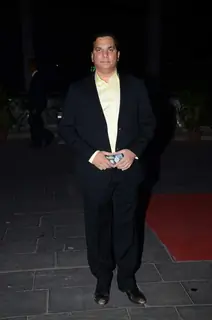 Lalit Pandit poses for the media at Tulsi Kumar's Wedding Reception