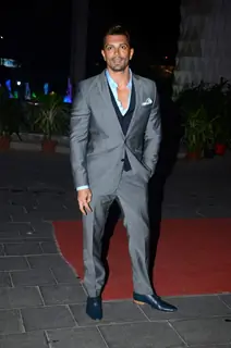 Karan Singh Grover poses for the media at Tulsi Kumar's Wedding Reception