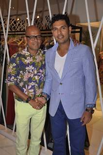 Yuvraj Singh and Narendra Kumar pose for the media at the Store Launch