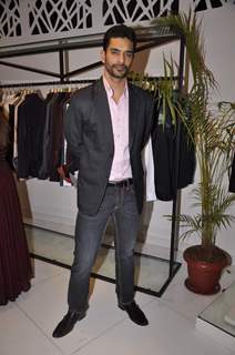 Angad Bedi poses for the media at Narendra Kumar's Store Launch