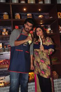 Arjun Kapoor and Farah Khan pose for the media at Farah Ki Daawat