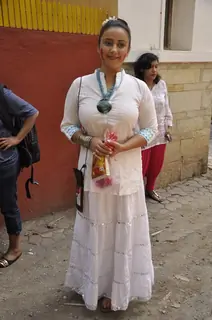 Divya Dutta poses for the media at Shabana Azmi's Holi Bash
