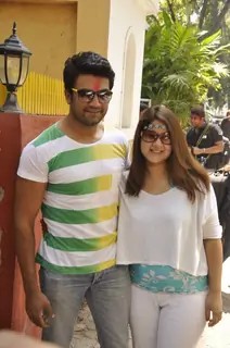 Sharad Kelkar and Keerti Gaekwad Kelkar pose for the media at Shabana Azmi's Holi Bash