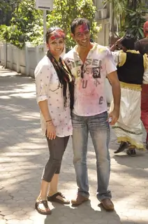 Anup Soni and Juhi Babbar pose for the media at Shabana Azmi's Holi Bash