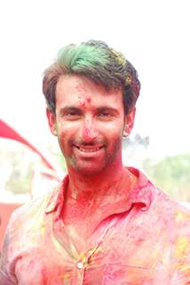 Nandish Sandhu poses for the media at Holi Celebrations