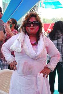 Dolly Bindra poses for the media at Holi Celebrations