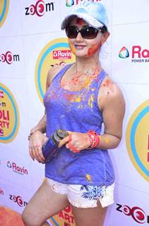 Rashmi Desai poses for the media at Zoom Holi Bash